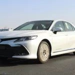 2023 TOYOTA CAMRY GLE HYBRID 2.5L A/T - Thumbnail 1