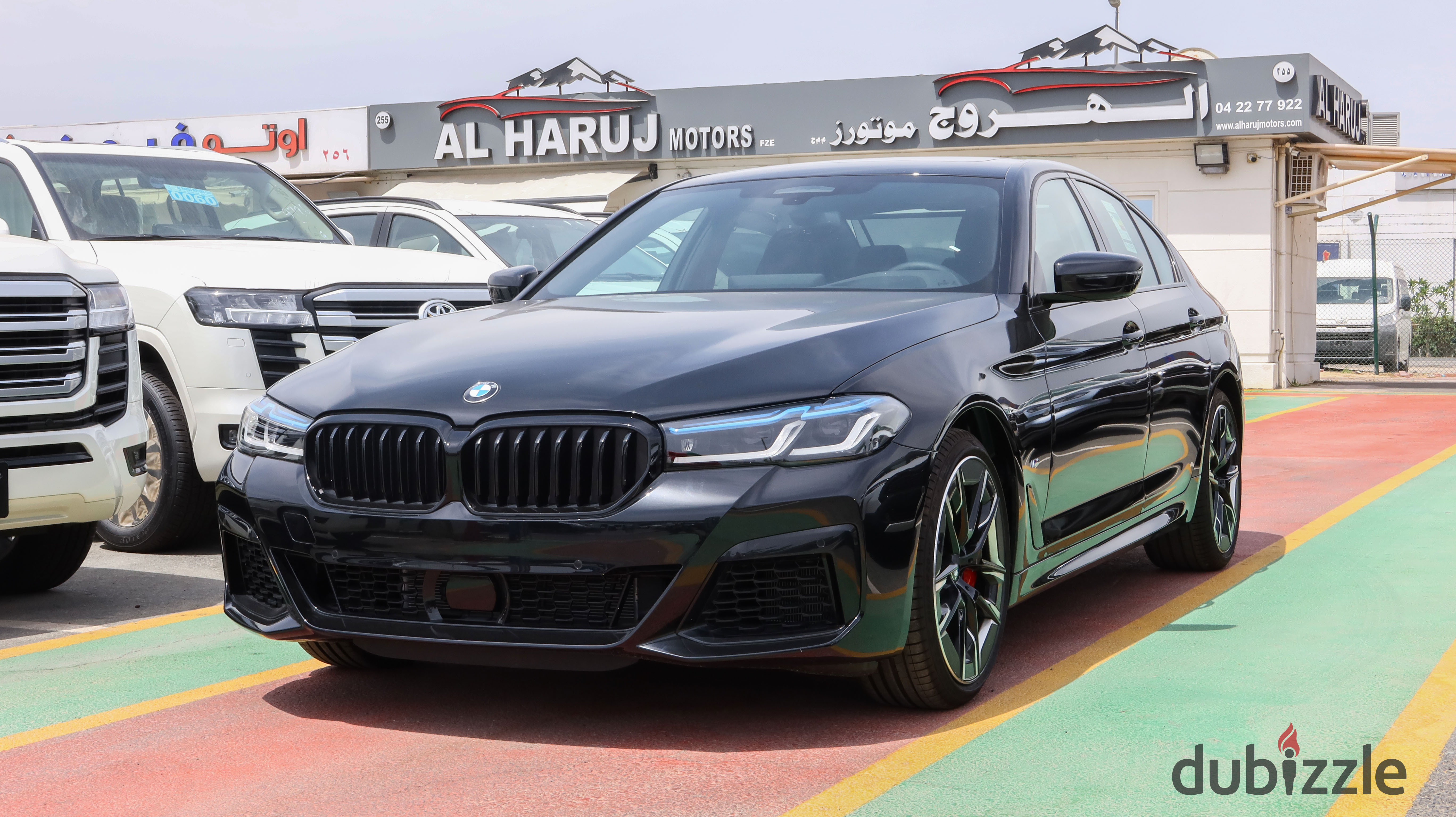 ALHARUJ MOTORS FZE dealership logo