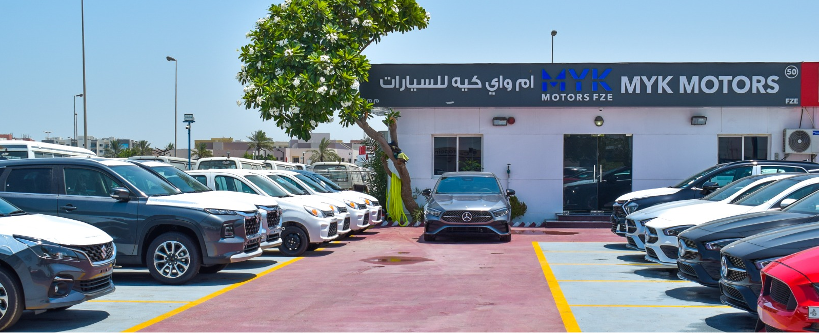 MYK MOTORS dealership logo