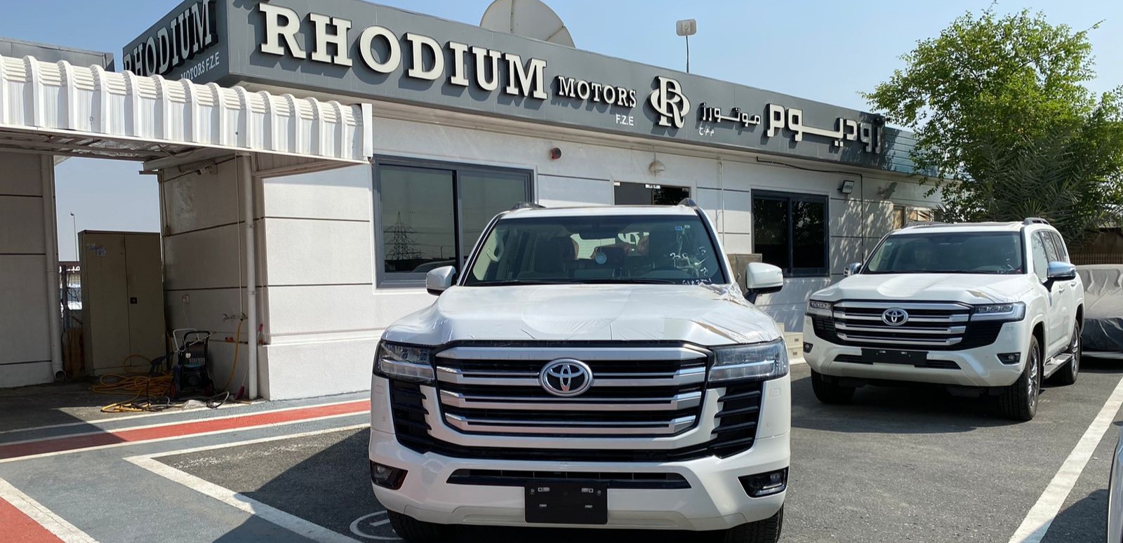 RHODIUM MOTORS FZE dealership logo