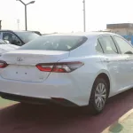 TOYOTA CAMRY LE BASIC 2.5L PETROL FWD 2023 MODEL YEAR WHITE COLOR - Thumbnail 5