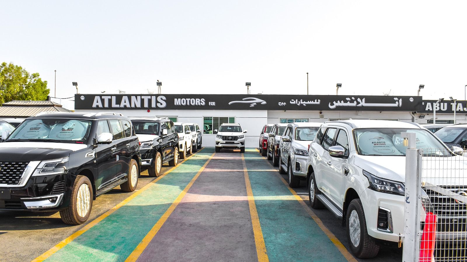 ATLANTIS MOTORS dealership logo
