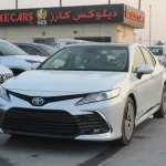 Toyota Camry Limited 3.5L petrol V6 fwd 2023 white inside beige - Thumbnail 1