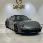 PORSCHE 911 CARRERA S MODEL 2022 KM 13,000 GCC AL NABOODA ONE YEAR WARRANTY - Thumbnail 1