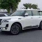 Nissan Patrol PLATINUM FULL OPTION 5.7L V8 4WD WHITE COLOR 2023 - Thumbnail 1