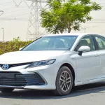 Toyota Camry LE 2.5L Hybrid 2024 Model Year White Color - Thumbnail 1