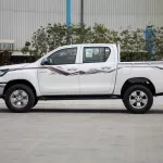 2024 Toyota Hilux 2.4L DC WB 4X4 - Super White inside Red - Thumbnail 3