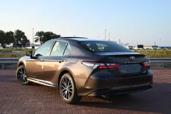TOYOTA CAMRY GLE 2024 MODEL YEAR HYBRID BROWN COLOR