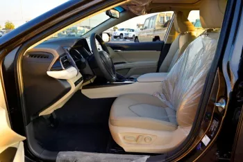 TOYOTA CAMRY GLE 2024 MODEL YEAR HYBRID BROWN COLOR