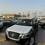 NISSAN PATROL LE T2 PREMIER 2024 MODEL YEAR BLACK COLOR EXTERIOR - Thumbnail 1
