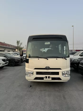 2024 Toyota Coaster 4.0L Diesel 23 seater 2024 with cool box, luggage rack, and curtains