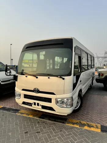 2024 Toyota Coaster 4.0L Diesel 23 seater 2024 with cool box, luggage rack, and curtains