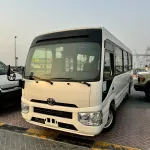 2024 Toyota Coaster 4.0L Diesel 23 seater 2024 with cool box, luggage rack, and curtains - Thumbnail 2