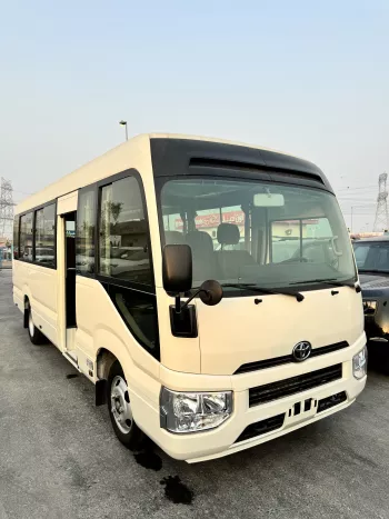 2024 Toyota Coaster 4.0L Diesel 23 seater 2024 with cool box, luggage rack, and curtains