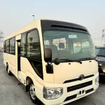 2024 Toyota Coaster 4.0L Diesel 23 seater 2024 with cool box, luggage rack, and curtains - Thumbnail 3