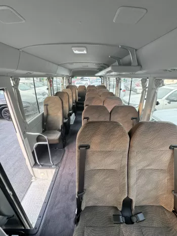 2024 Toyota Coaster 4.0L Diesel 23 seater 2024 with cool box, luggage rack, and curtains