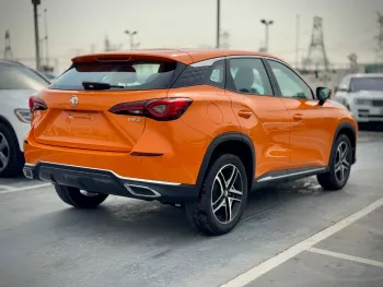 MG ONE 1.5L Petrol 2024 Model Year Orange Color Exterior Black Color Interior