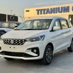 SUZUKI ERTIGA GLX 1.5L PETROL 2025 MODEL YEAR WHITE COLOR EXTRIOR - Thumbnail 1