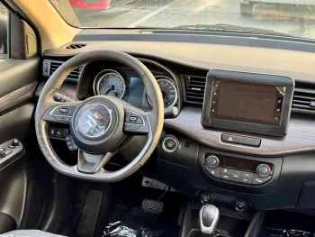SUZUKI ERTIGA GLX 1.5L PETROL 2025 MODEL YEAR WHITE COLOR EXTRIOR