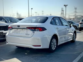 TOYOTA COROLLA PIONEER 1.8L HYBRID 2024 MODEL WHITE Automatic