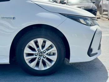 TOYOTA COROLLA PIONEER 1.8L HYBRID 2024 MODEL WHITE Automatic
