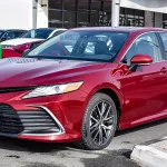 Toyota Camry 2.5L XLE Hybrid 2022 Model Year Red Color Exterior - Thumbnail 2