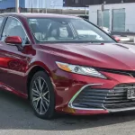 Toyota Camry 2.5L XLE Hybrid 2022 Model Year Red Color Exterior - Thumbnail 1