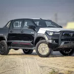 TOYOTA HILUX ADVENTURE 2025 MODEL YEAR PETROL BLACK COLOR EXTERIOR - Thumbnail 1