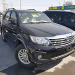 TOYOTA FORTUNER 4X4 PETROL 2015 MODEL YEAR BLACK COLOR EXTERIOR - Thumbnail 1