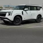 NISSAN PATROL LE T2 GCC SPECS 2025 MODEL YEAR WHITE COLOR EXTERIOR - Thumbnail 1