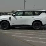 NISSAN PATROL LE T2 GCC SPECS 2025 MODEL YEAR WHITE COLOR EXTERIOR - Thumbnail 4