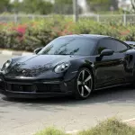Porsche 911 Turbo S 3.8L 2024 Model Year Black Color Exterior - Thumbnail 1