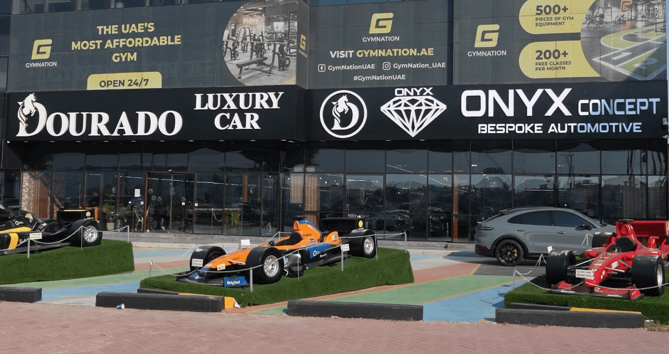 Dourado Luxury Car dealership logo