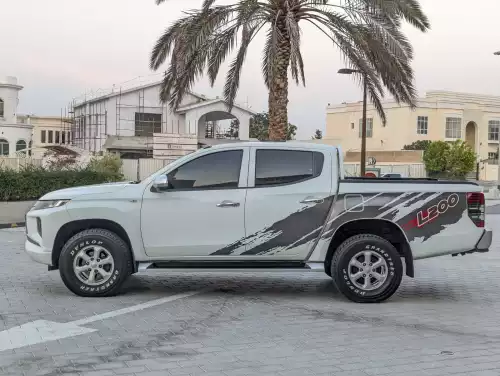 Mitsubishi L200 GLX 2.4L Diesel 2021 Model Year White Color Exterior 
