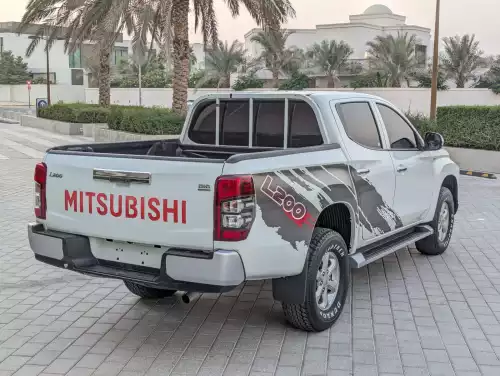 Mitsubishi L200 GLX 2.4L Diesel 2021 Model Year White Color Exterior 