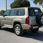 Nissan Patrol Safari 4.8L VTC 2017 - Gold Color Exterior - Carsooq - Thumbnail 5