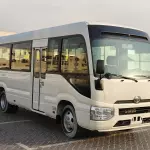 2025 Toyota Coaster High-Roof 23-Seater (2-Point Seatbelts) 4.0L 4-Cyl Turbo Diesel M/T RWD Export Only - Thumbnail 1