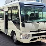 Toyota Coaster 23 Seater 2.7L Petrol 2026 Model Year White Color Exterior - Thumbnail 1