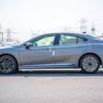 Toyota Camry LE 2.5L Hybrid 2025 Model Year Gray Color Exterior  - Thumbnail 5