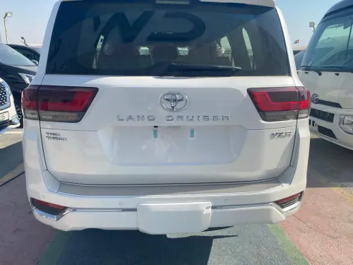 2026 Toyota Land Cruiser VXR  3.5L White Exterior Red and Black Interior