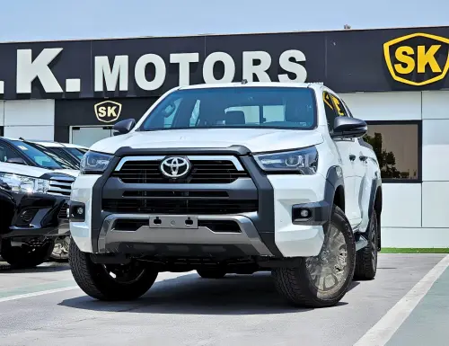 Toyota Hilux SR5 Adventure 2026 4.0L V6 White Exterior Grey Interior