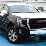 GMC Yukon SLE 2WD GCC Outside Black Inside Beige 2022. - Thumbnail 1