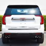 GMC YUKON DENAIL GCC OUTSIDE WHITE AND INSIDE BROWN MODEL 2022. - Thumbnail 4