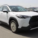 TOYOTA COROLLA CROSS 1.8L FWD WHITE HYBRID 2023 - Thumbnail 1