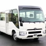 Toyota Coster Petrol + Diesel 2.7L With fridge - Thumbnail 1