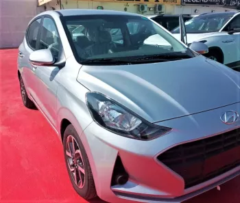 Hyundai Grand i10 AT 1.2L Hatchback FWD 5 Doors, Color Silver, Model 2023